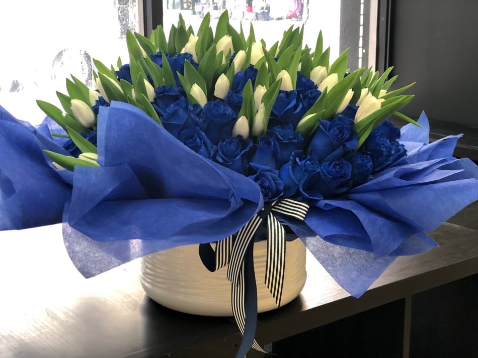 Chic Flower Arrangement With Tulips And Royal Blue Roses