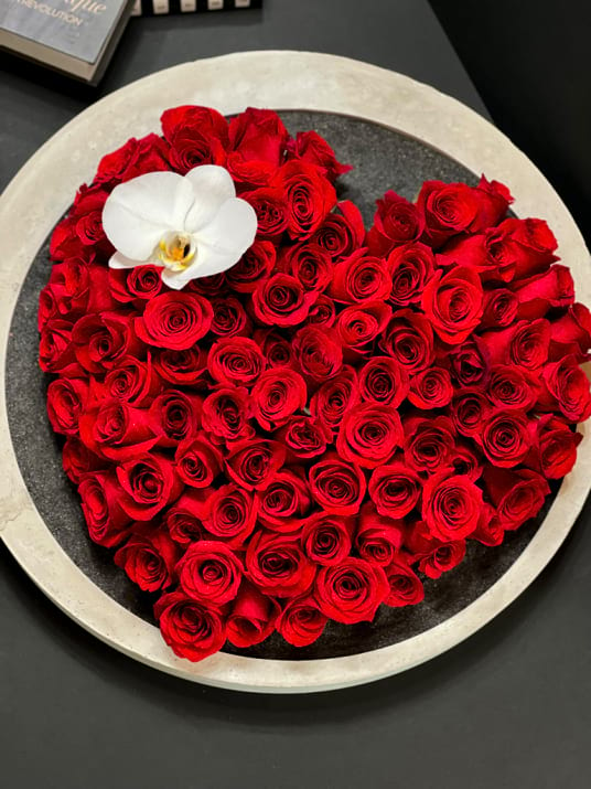 Red Roses Arrangement In Custom Round Tray